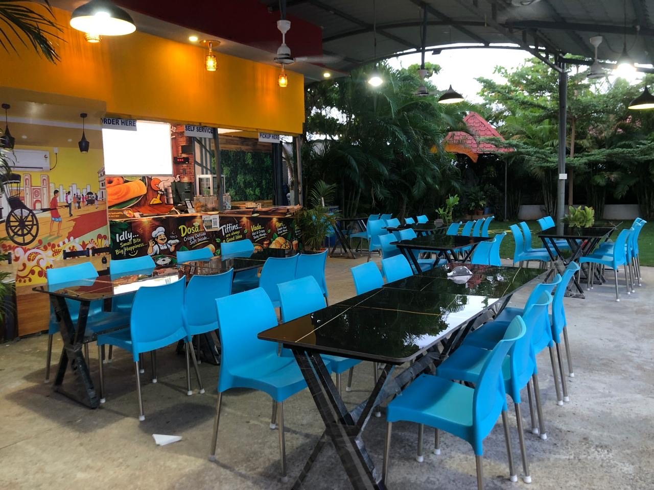 Open-air dining beside the garden